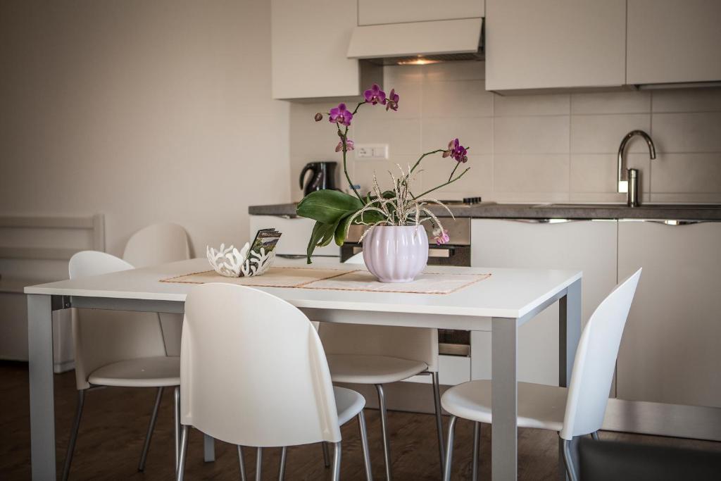 Kuchyň nebo kuchyňský kout v ubytování Le Servite Apartments