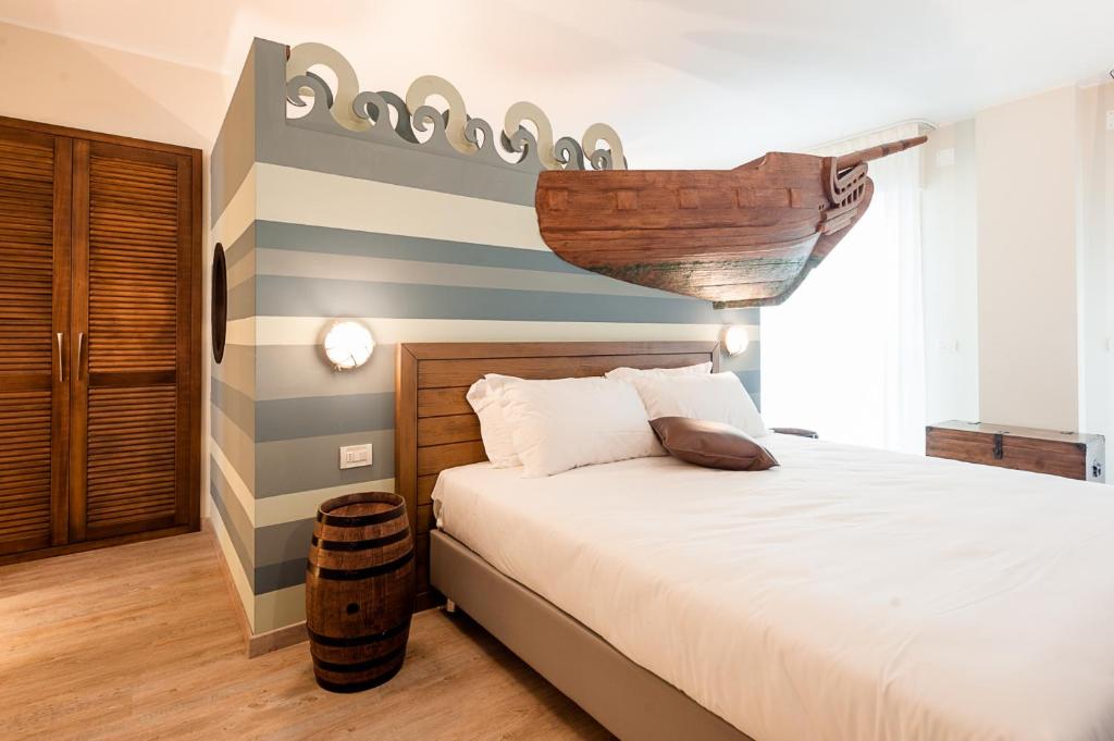 Postel nebo postele na pokoji v ubytování Hotel San Michele