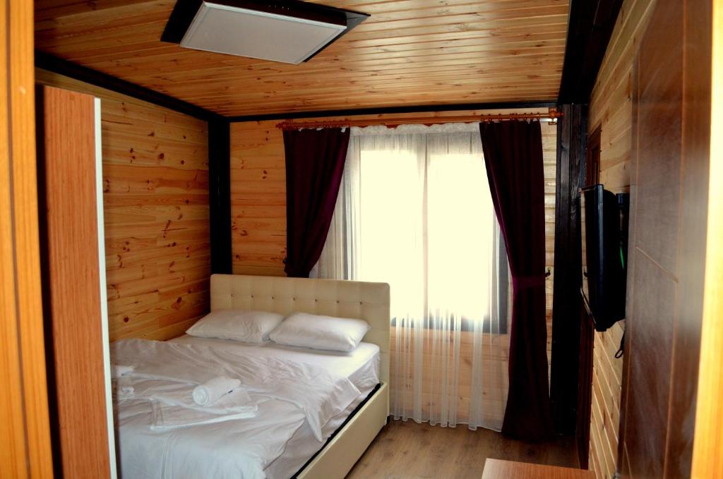 Postel nebo postele na pokoji v ubytování Osmanlı Suite