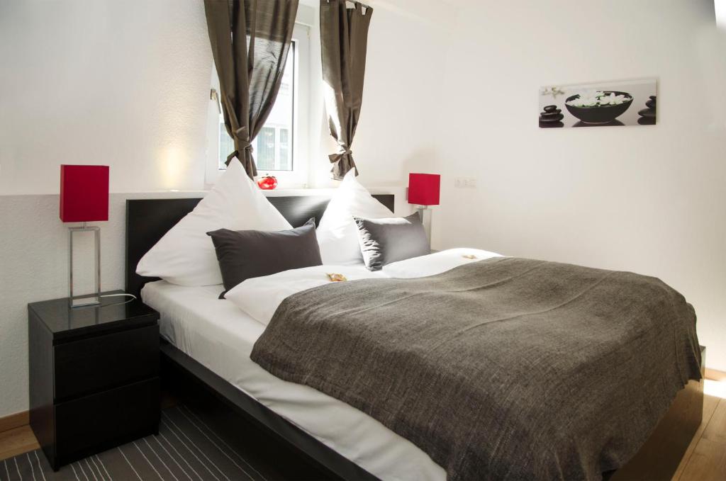 Postel nebo postele na pokoji v ubytování Apart Hotel Paradies