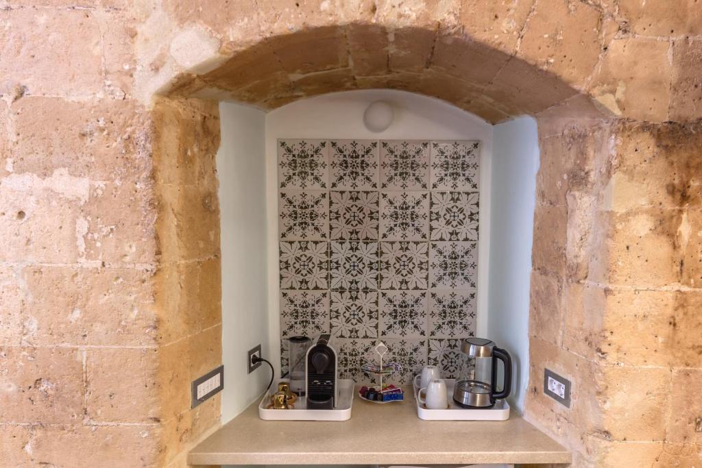 Kuchyň nebo kuchyňský kout v ubytování B&B Ponticello a San Potito