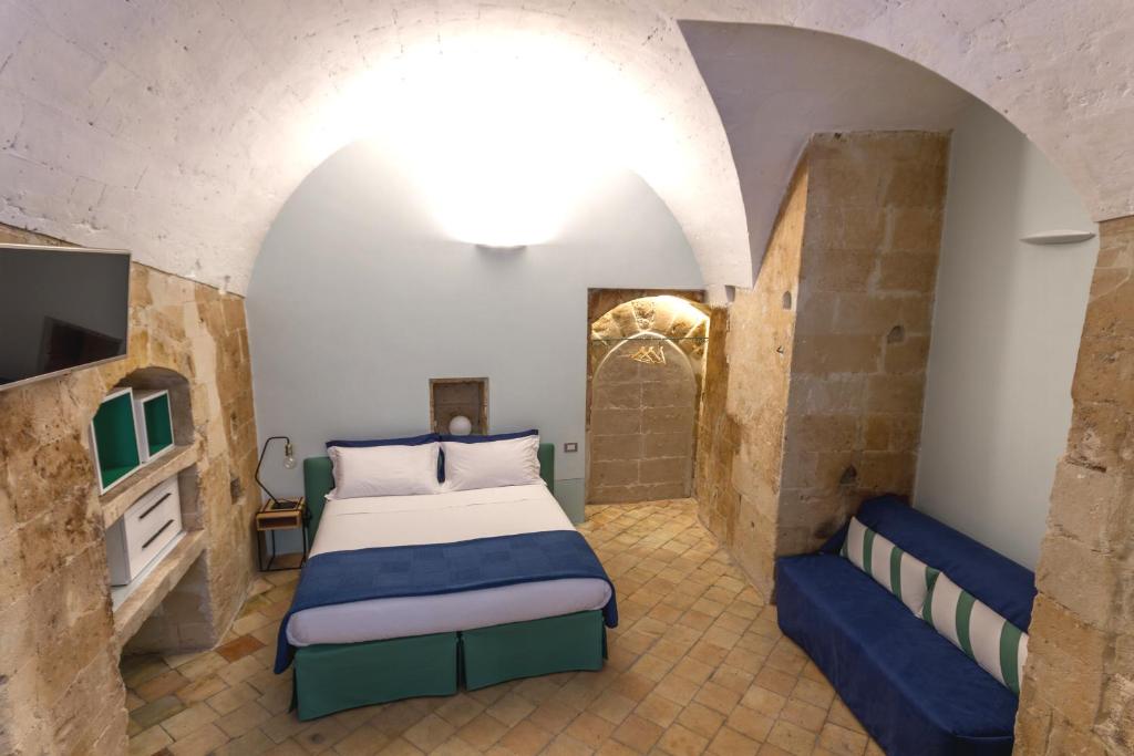 Postel nebo postele na pokoji v ubytování B&B Ponticello a San Potito