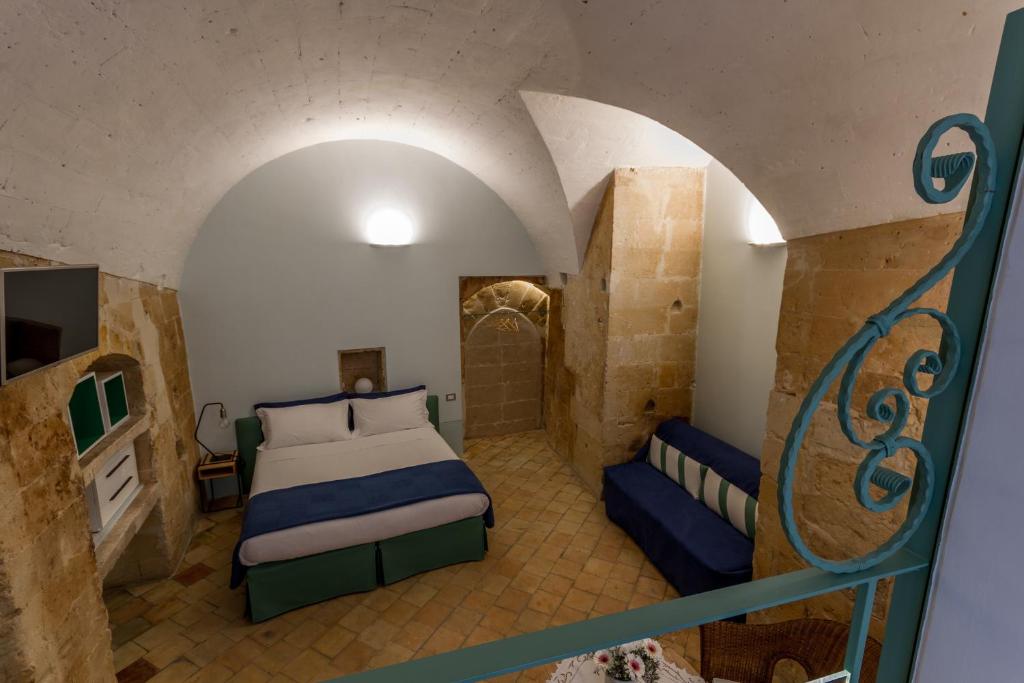 Postel nebo postele na pokoji v ubytování B&B Ponticello a San Potito