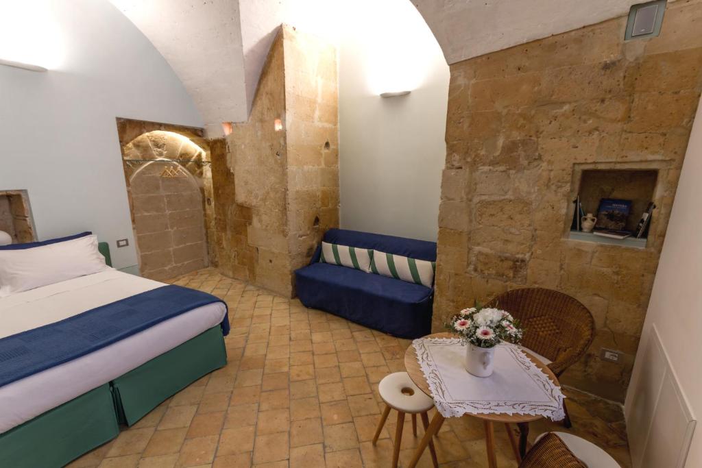 Postel nebo postele na pokoji v ubytování B&B Ponticello a San Potito