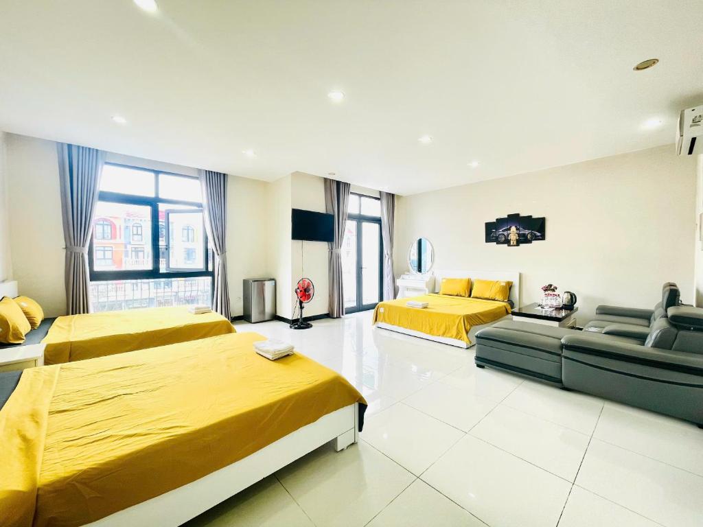 Ένα ή περισσότερα κρεβάτια σε δωμάτιο στο Haleeda Homestay Grand World Phú Quốc