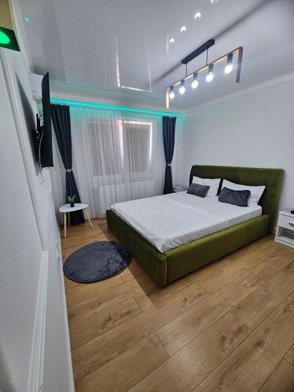 Postel nebo postele na pokoji v ubytování Modern & Glam Studio Costi