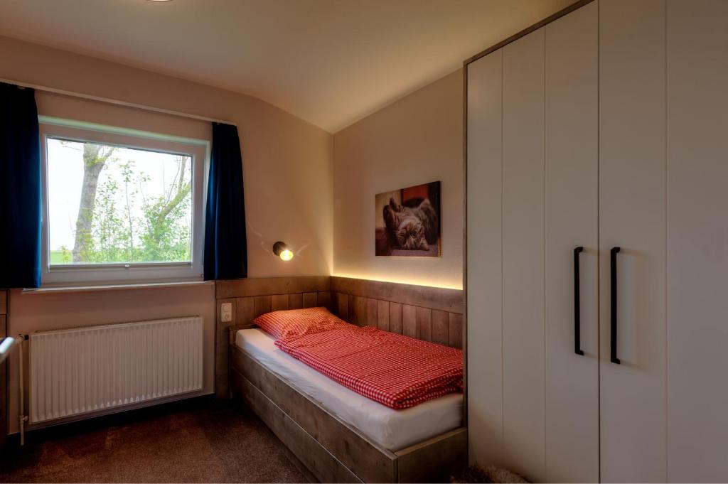Postel nebo postele na pokoji v ubytování Schwalbe