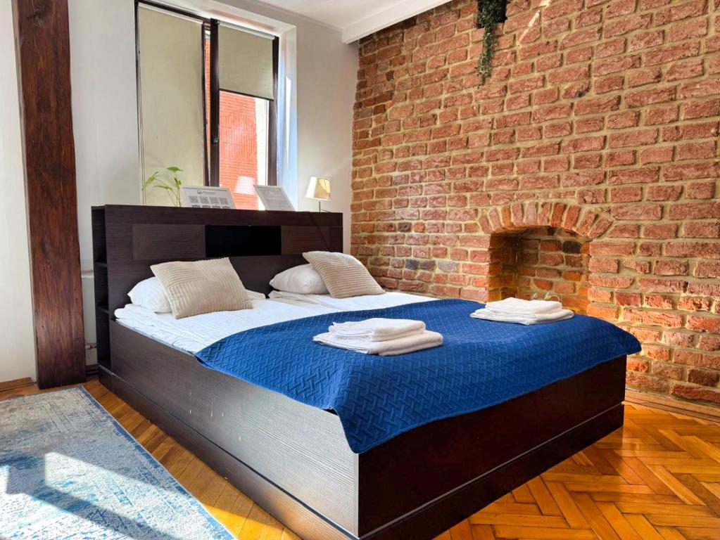 Ένα ή περισσότερα κρεβάτια σε δωμάτιο στο Garsoniera by Rentoom