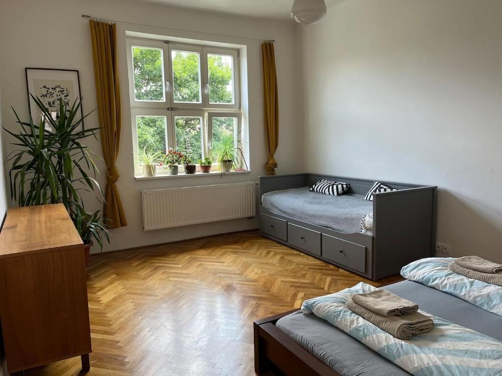 Katil atau katil-katil dalam bilik di A comfortable apartment near Slovanské Square
