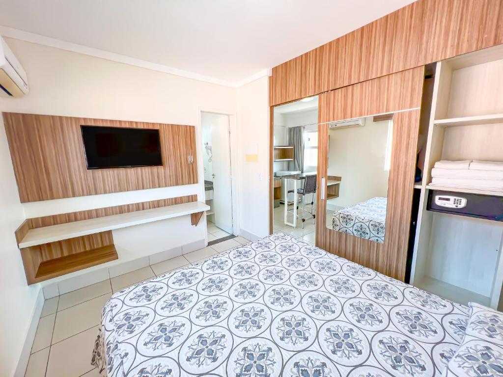 Postel nebo postele na pokoji v ubytování diRoma Lacqua III direto com o Grupo diRoma com acesso ao Acqua Park e Café da manhã