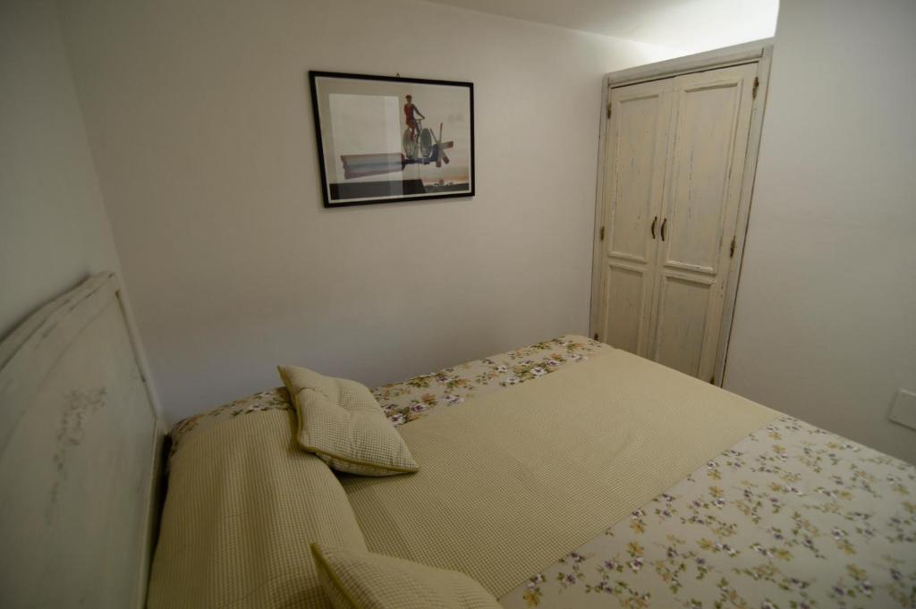 Postel nebo postele na pokoji v ubytování La Vignola Country Hotel