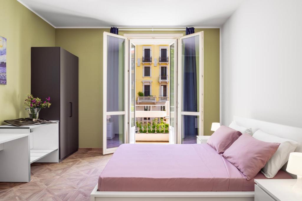 Un pat sau paturi într-o cameră la Premuda luxury apartments 2