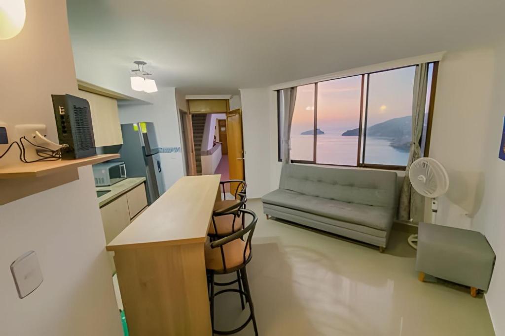 Kuchyň nebo kuchyňský kout v ubytování Oasis Marino - Apartamento de 2 Alcobas en El Rodadero