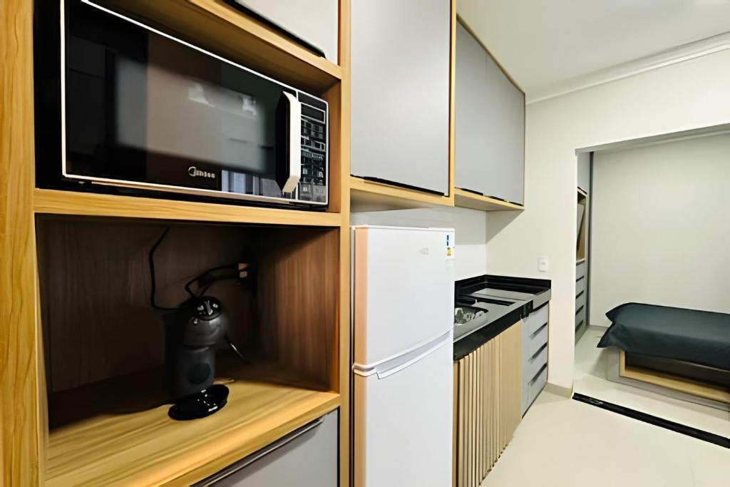 Dapur atau dapur kecil di Loft 101 – Refúgio Certo, a poucos passos da Ufu.
