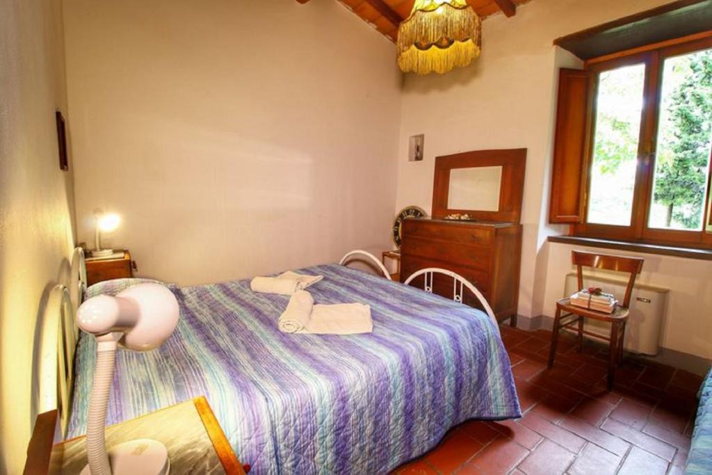 Postel nebo postele na pokoji v ubytování Casa Vacanza Le Corniole