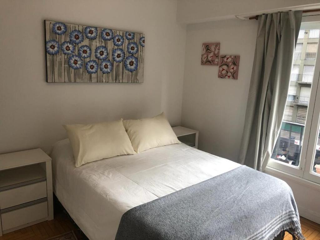 Ένα ή περισσότερα κρεβάτια σε δωμάτιο στο Tu refugio en MDP, cómodo y céntrico