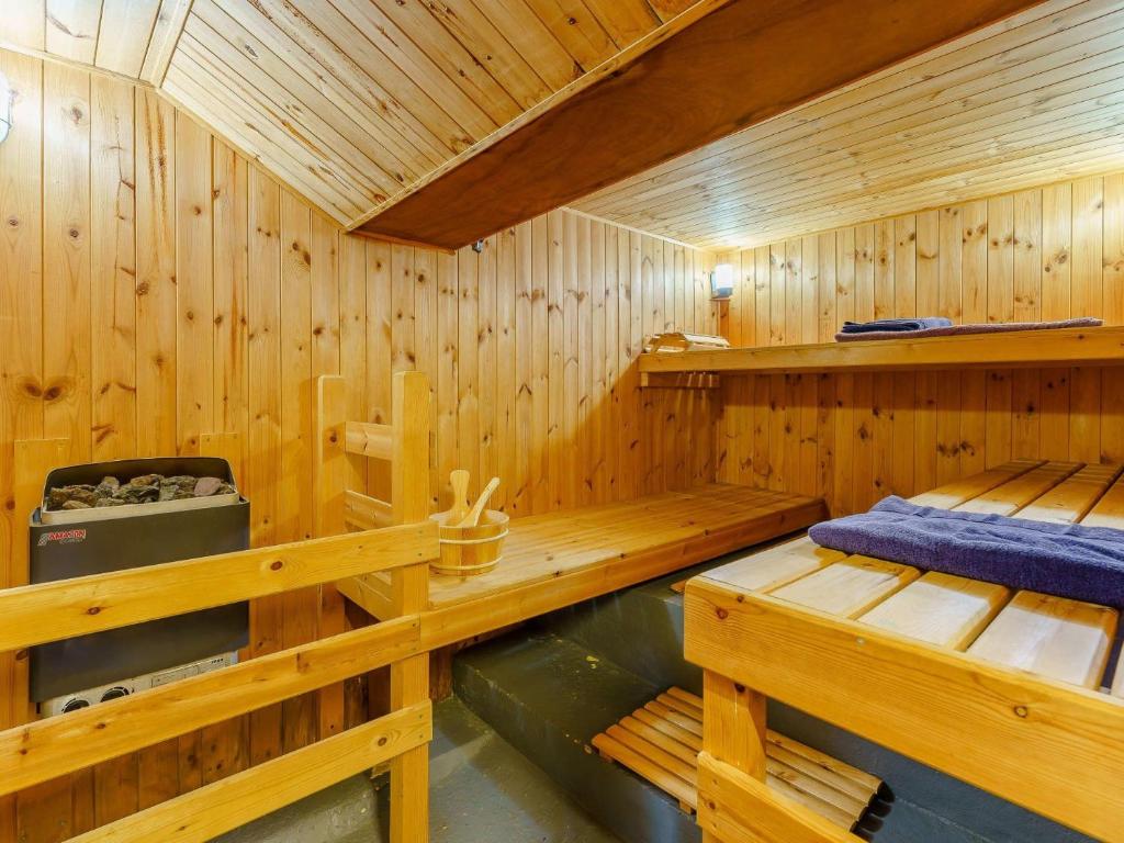 a wooden sauna with two beds in it at 1 bed in Sandown 85248 in Sandown