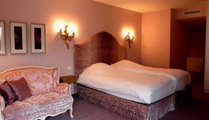 Postel nebo postele na pokoji v ubytování Hôtel à la Ferme