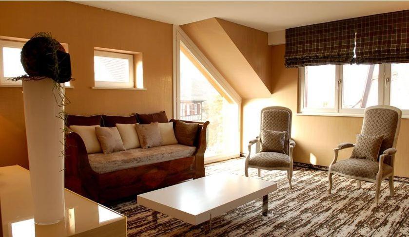 Posezení v ubytování Hôtel à la Ferme