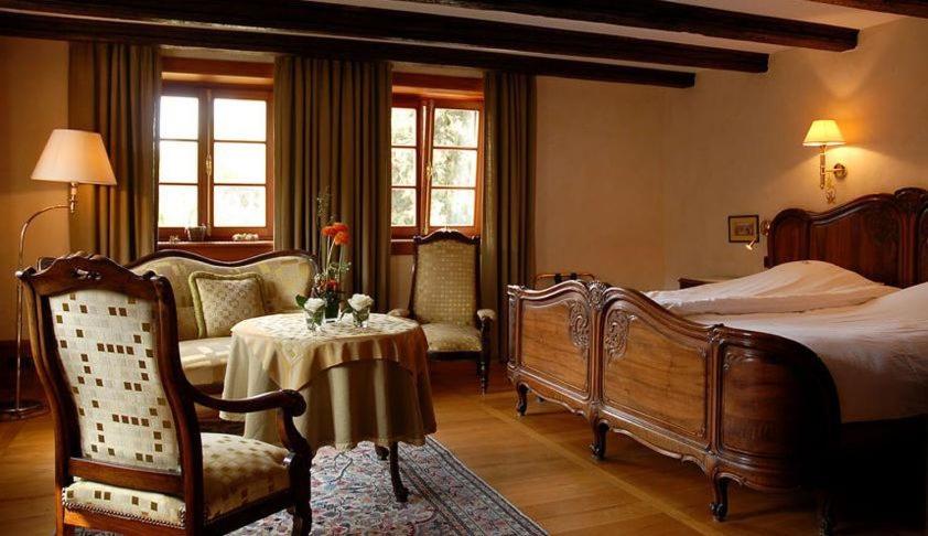 Postel nebo postele na pokoji v ubytování Hôtel à la Ferme