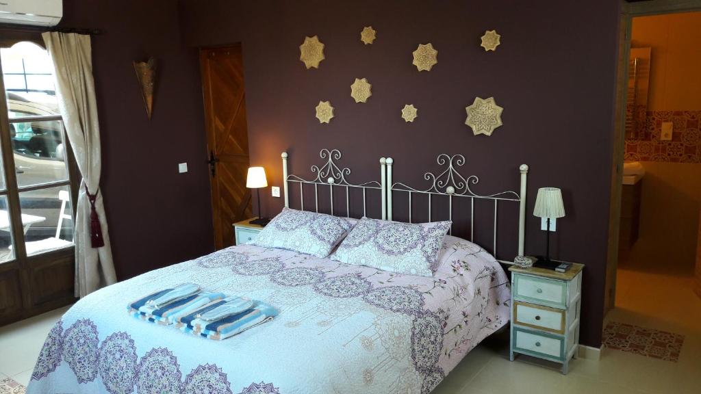 Postel nebo postele na pokoji v ubytování Casa Roble B&B