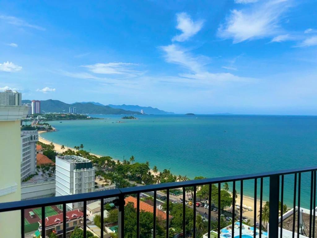 a view of the ocean from a balcony at Gold Coast Apartment Nha Trang in Nha Trang