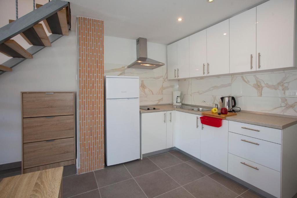 Kuchyňa alebo kuchynka v ubytovaní Mar e Sol Apartments