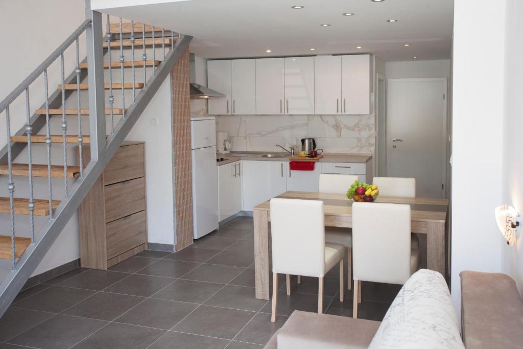 Kuchyňa alebo kuchynka v ubytovaní Mar e Sol Apartments