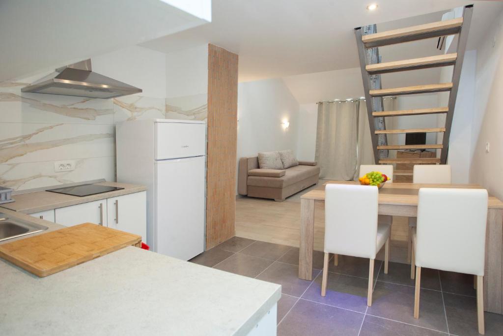 Kuchyňa alebo kuchynka v ubytovaní Mar e Sol Apartments