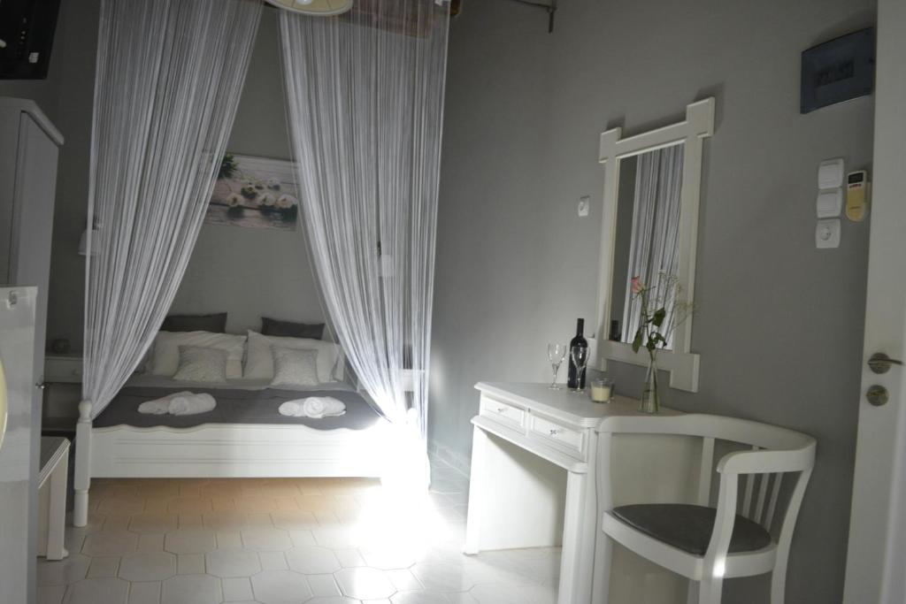Postel nebo postele na pokoji v ubytování Magnolia Senses