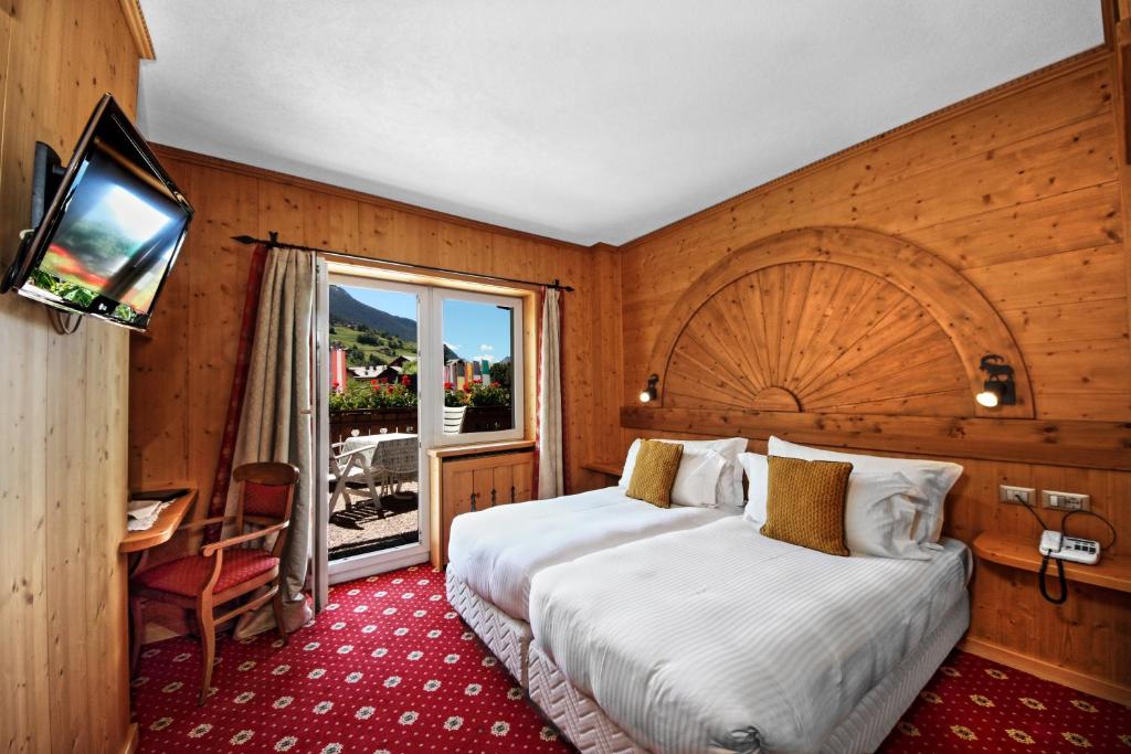 Легло или легла в стая в Hotel Baita Dei Pini