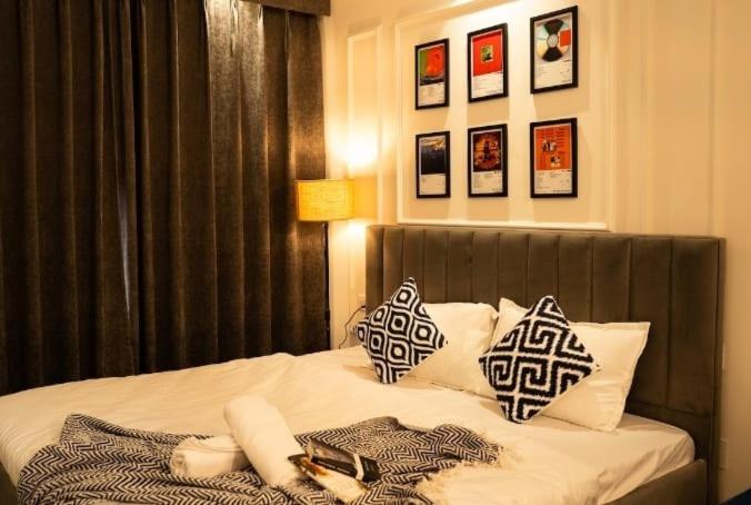 Ένα ή περισσότερα κρεβάτια σε δωμάτιο στο Hotel Wind Sky Inn