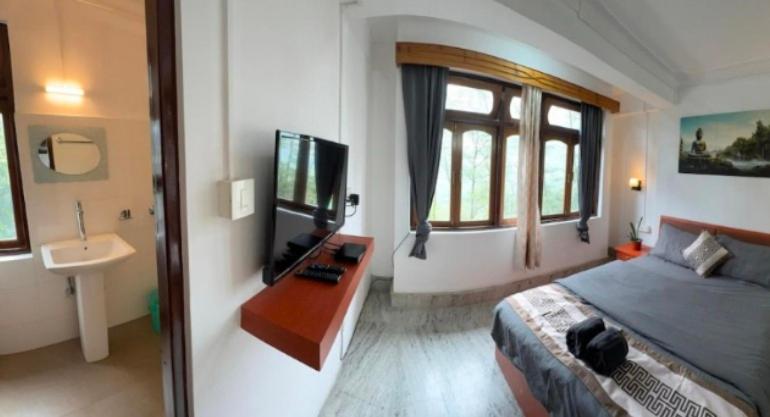 Ένα ή περισσότερα κρεβάτια σε δωμάτιο στο Hotel peace