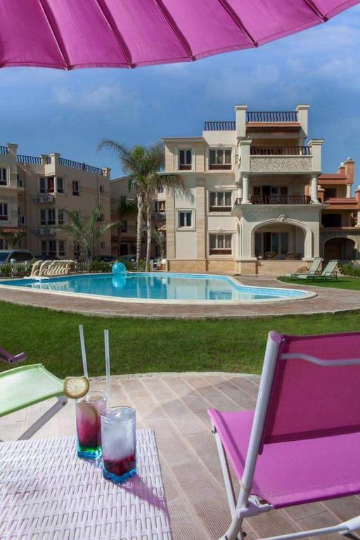 Bazén v ubytování Mirage Hotel Sidi Abd El Rahman nebo v jeho okolí