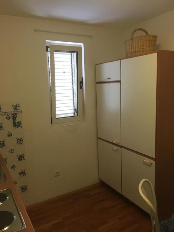Kuchyň nebo kuchyňský kout v ubytování Apartment Velada