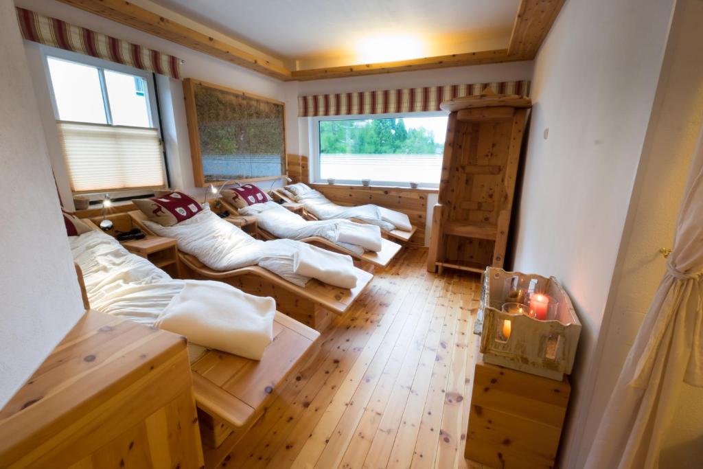 Postel nebo postele na pokoji v ubytování Die Nockalm