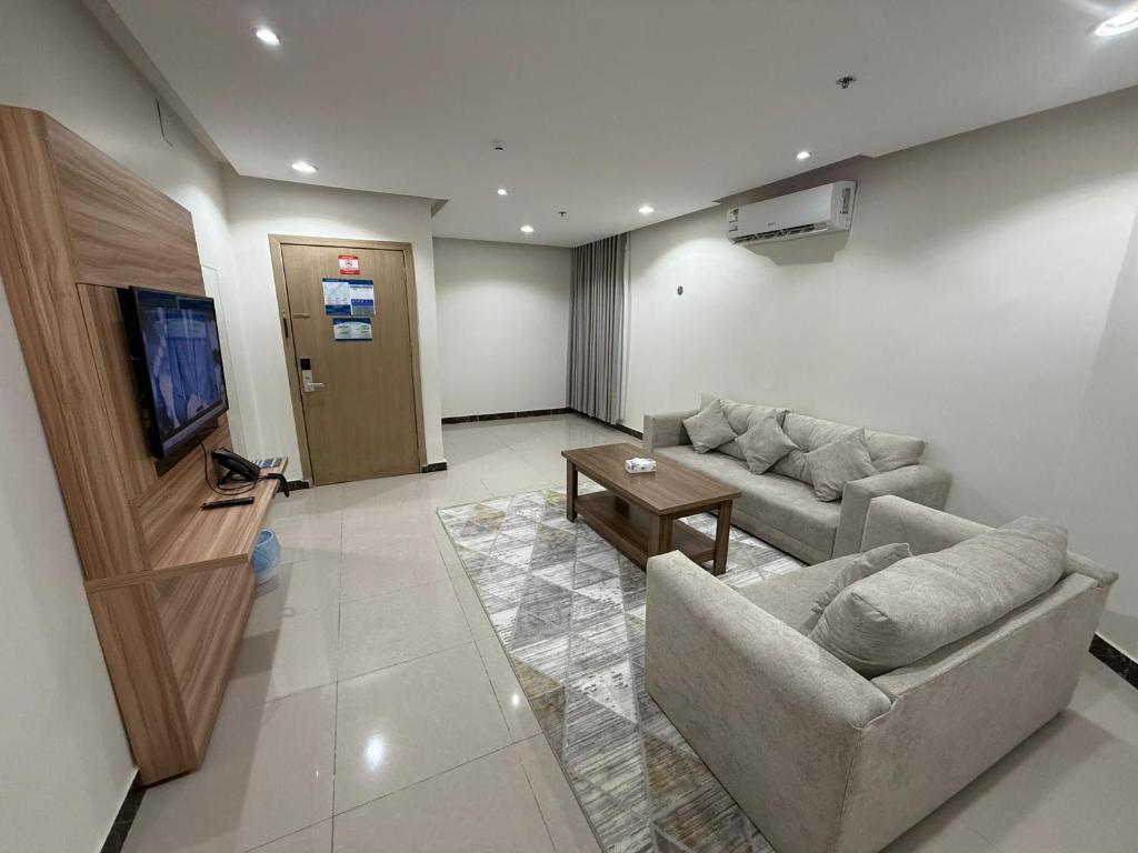 TV a/nebo společenská místnost v ubytování شقق دفادف المخدومة