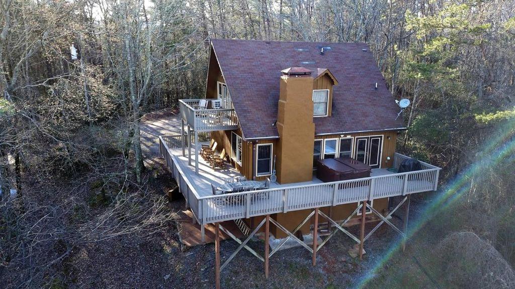 an aerial view of a house in the woods at Luxury Mountain Cabin Rental with a Hot Tub in Helen, Georgia in Helen