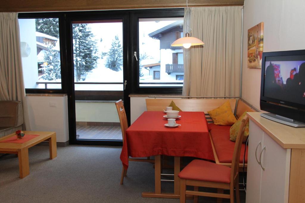 Telewizja i/lub zestaw kina domowego w obiekcie Alpina Residence