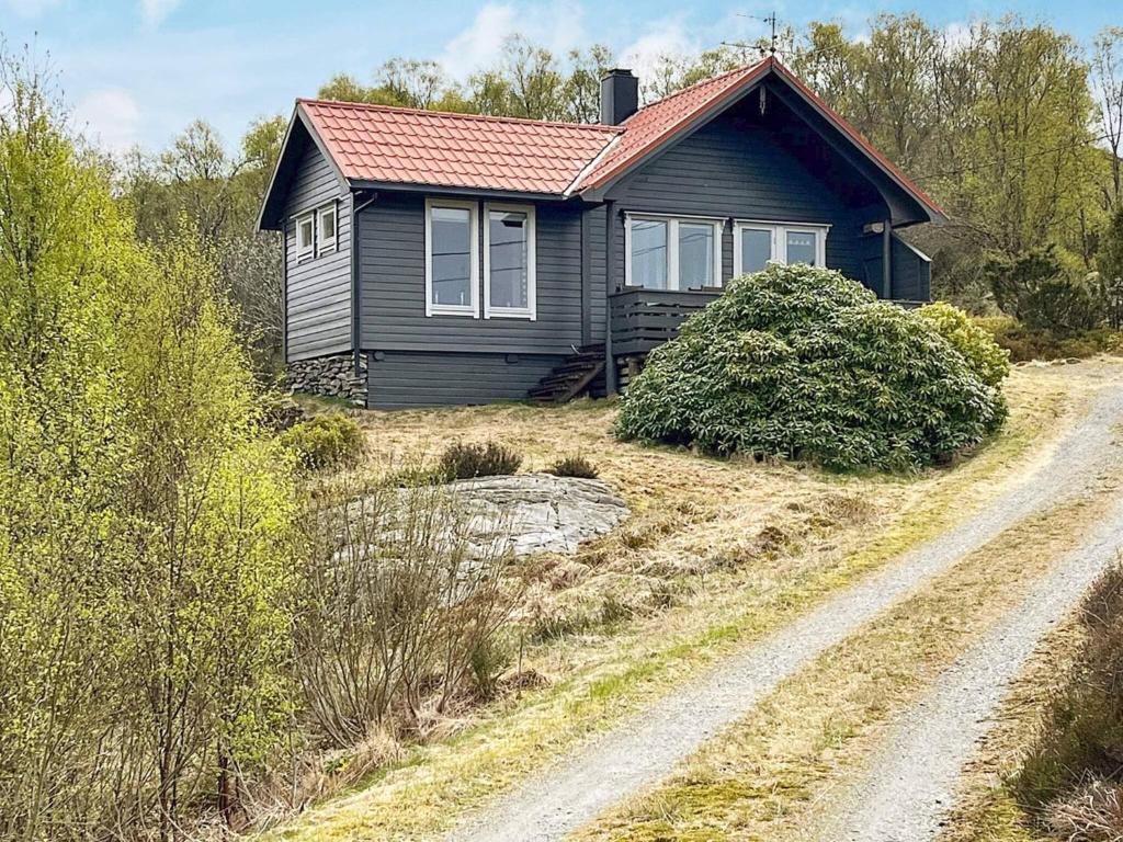 Κήπος έξω από το 6 person holiday home in Ånneland