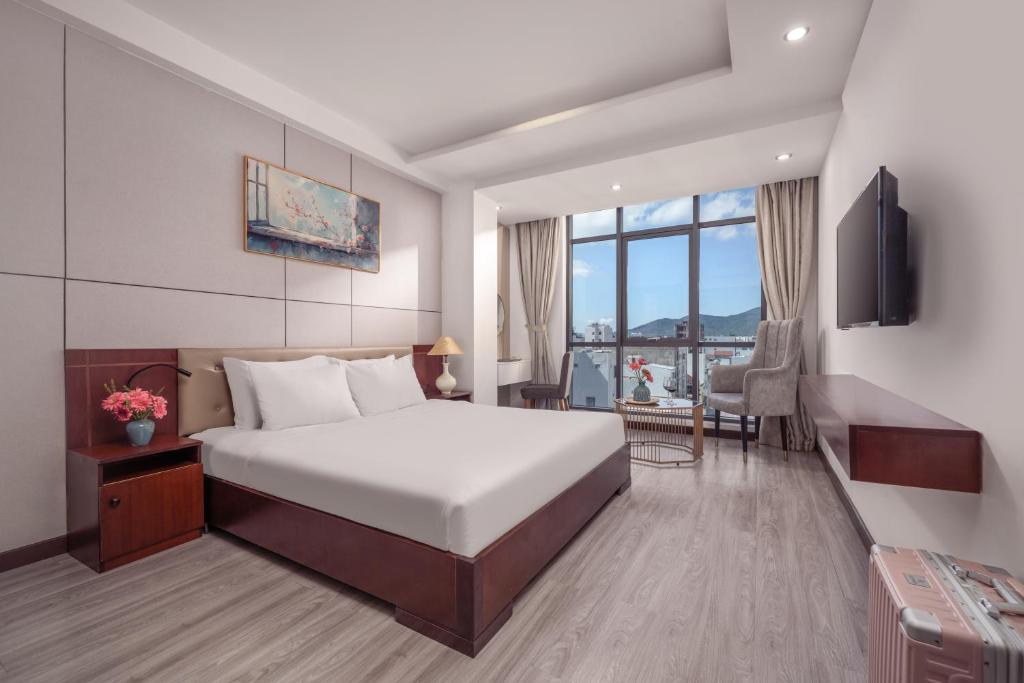 Ένα ή περισσότερα κρεβάτια σε δωμάτιο στο Star Hotel and Spa - Fitness