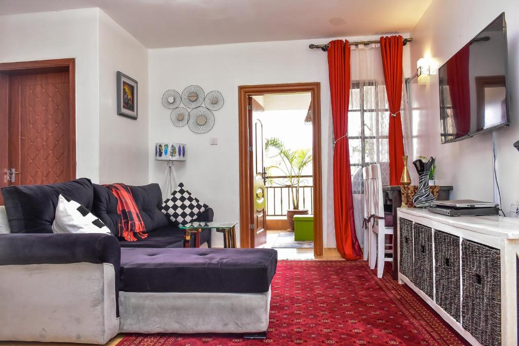 Гостиная зона в Chic City Apt with attached Private Bath 5km toUN