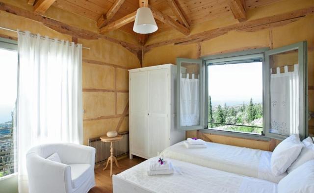 Postel nebo postele na pokoji v ubytování melivaro villa
