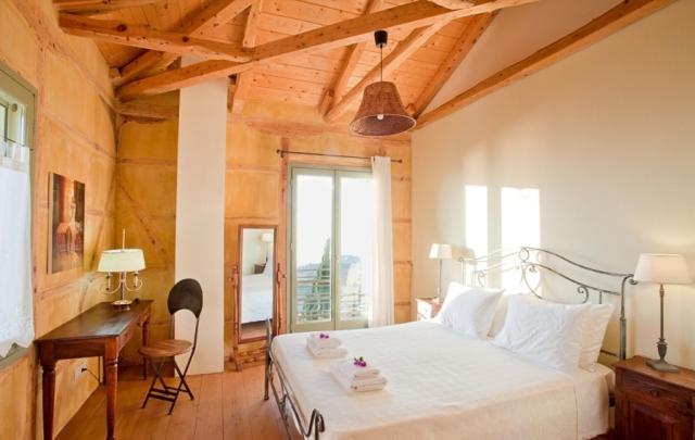 Postel nebo postele na pokoji v ubytování melivaro villa