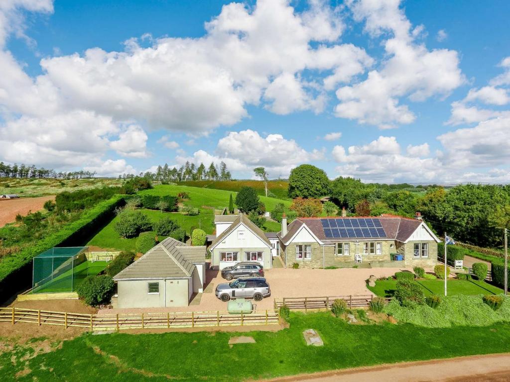an aerial view of a house with a solarium at 6 Bed in St Andrews 89572 in Leuchars