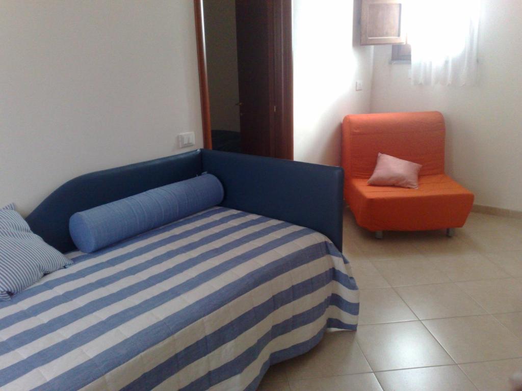 Postel nebo postele na pokoji v ubytování B&B Pacheco