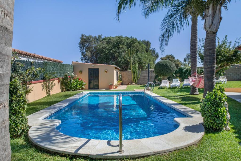 Bazén v ubytování Casa La Muela nebo v jeho okolí