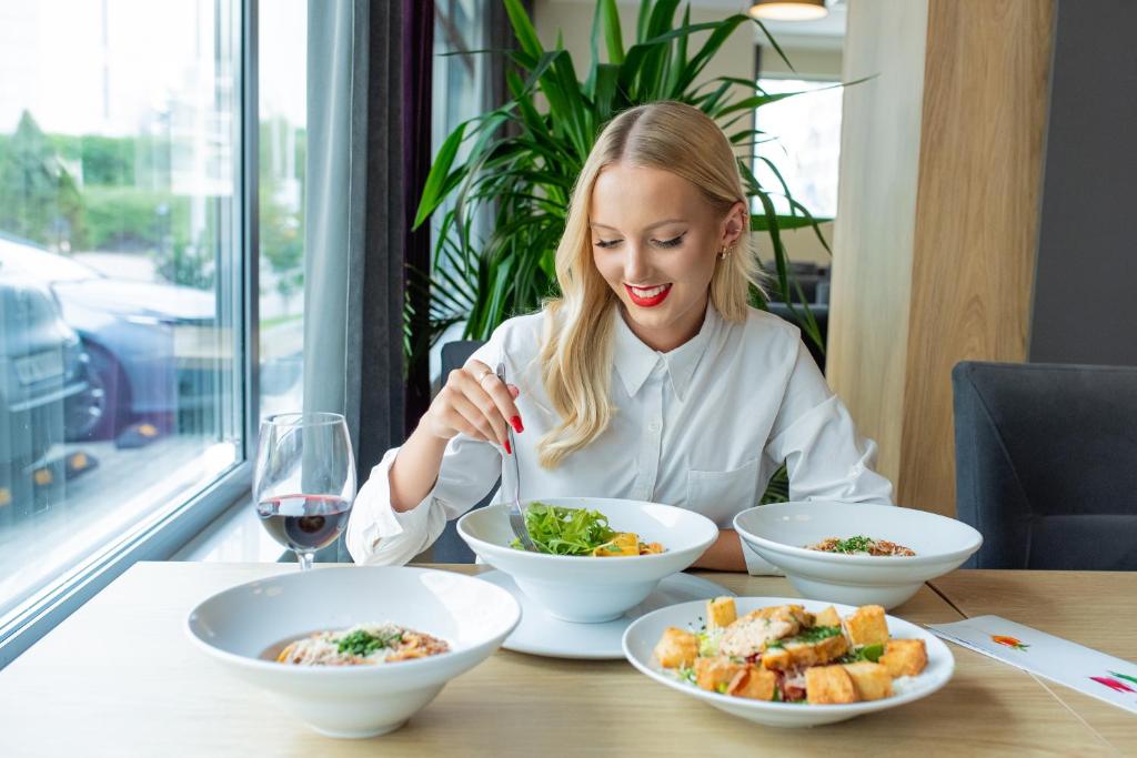 Hotel CONRAD Comfort - Resim 30