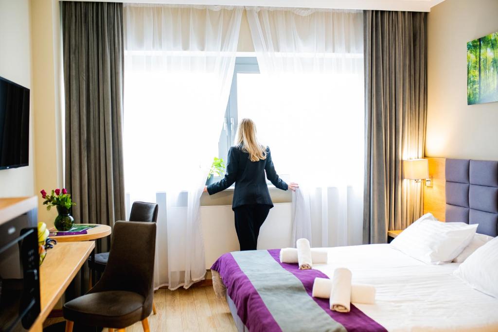 Hotel CONRAD Comfort - Resim 3