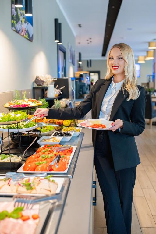 Hotel CONRAD Comfort - Resim 16